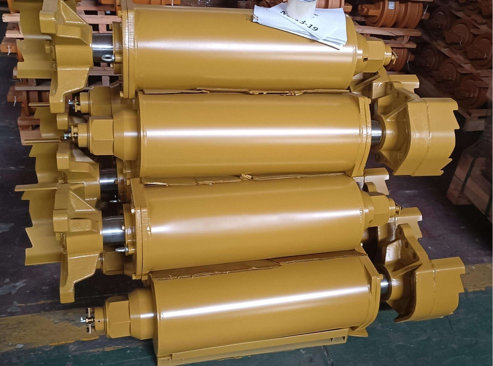 Close view of painted undercarriage rollers with visible running surfaces